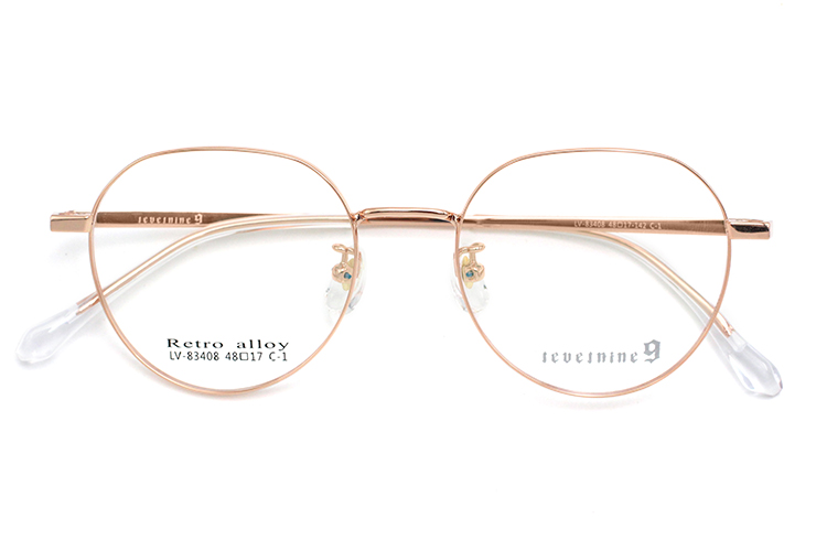 Arma&ccedil;&otilde;es &oacute;pticas redondas de metal - ouro