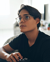 Varejista óptico da Malásia, Darren